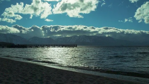 Slow motion waves crashing on sandy beach 動画素材 109258516
