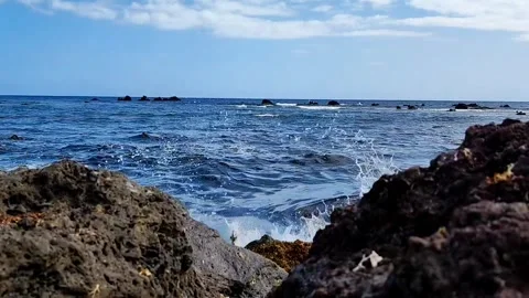 Slow Motion Waves Crashing on Volcanic Rocks - Tenerife Coastline Video stock 334628457