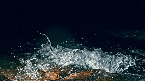 Slow motion of waves on dark water. Amazing dramatic natural background Stock Footage 98507992