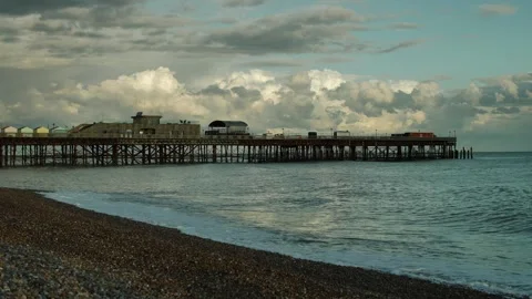 Slow motion waves hit pebbled beach at Hastings in UK 4K Stock Footage 285427329