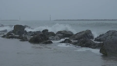 Slow Motion Waves Hitting Sea Defence 1 Stock Footage 84057958