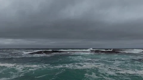 Slow Motion Waves Over Rocks at Kilkee Shore Stock-Footage 346964860