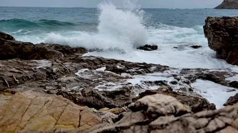Slow Motion Waves on the rocks1  Stock Footage 159023925