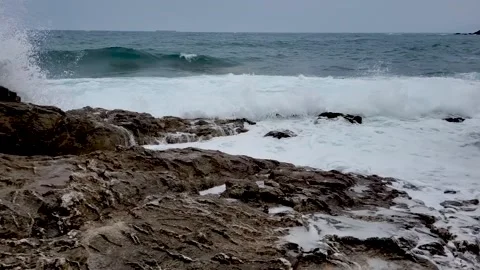 Slow Motion Waves on the rocks2  Stock Footage 159023917