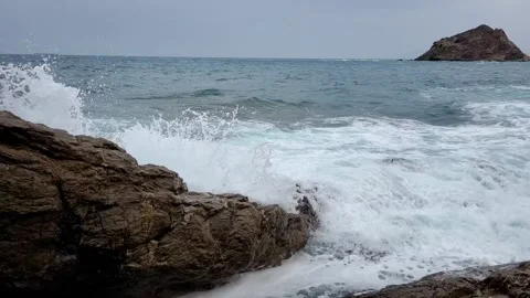 Slow Motion Waves on the rocks4  Stock Footage 159023906
