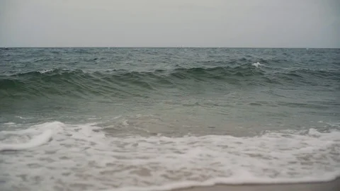 Slow motion waves rolling in on Cape Cod Stock Footage 90631498