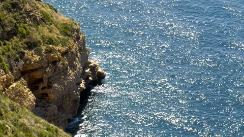 Slow Motion Waves On Rugged Coastline - Relaxing Worship Nature Background Stock Footage 109226320