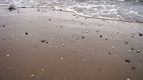 Slow motion waves on sandy beach calming peaceful concept Video stock 93851567