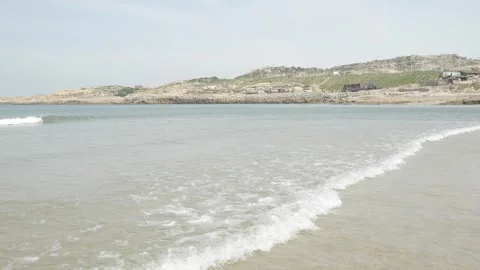 Slow motion waves on a sandy beach in Pingtan, Fujian, China. Stock Footage 344828131