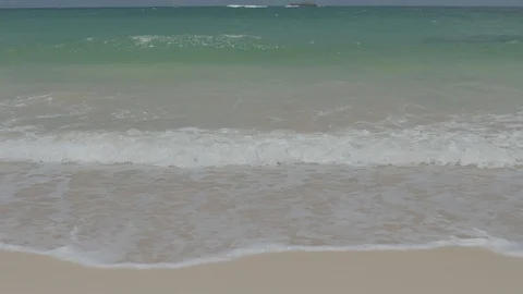 Slow Motion Waves on a Sandy White Beach Stock-Footage 100985479