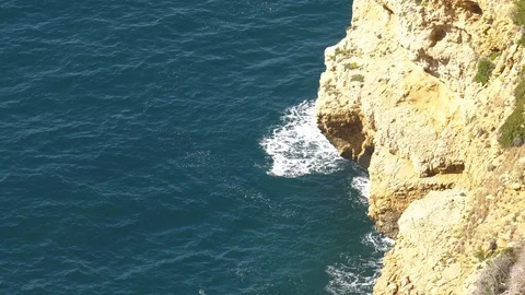 Slow Motion Waves On Sea Cliffs - Relaxing Coastal Nature Background 4K Stock Footage 108533017