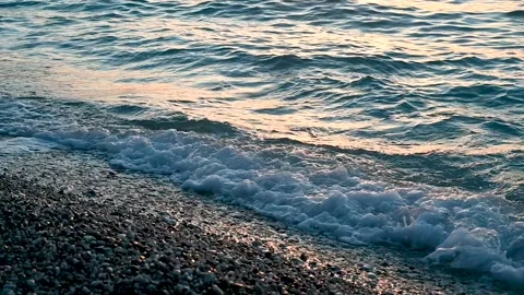 Slow motion of waves at sea. Soft waves at sunset on island. Stock Footage 167245649