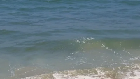 Slow motion waves on a sunny summer day in Santa Monica Stock-Footage 94237969