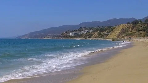 Slow motion waves on a sunny summer day in Santa Monica Stock-Footage 94238167