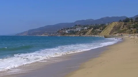 Slow motion waves on a sunny summer day in Santa Monica Stock-Footage 94238185