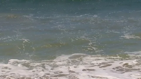 Slow motion waves on a sunny summer day in Santa Monica Stock-Footage 94238939