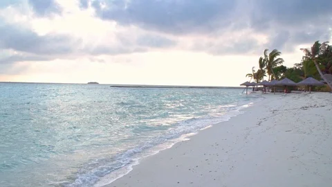 Slow motion of waves on tropical beach Stock Footage 125632159