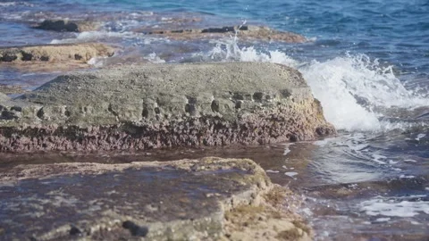 Slow Motion Waves Washing Over Coastal Rocks in Vladivostok, Russia Stock Footage 344231582