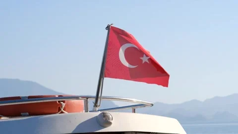 The slow motion waving Turkish flag above the boat. Stock Footage 268901648