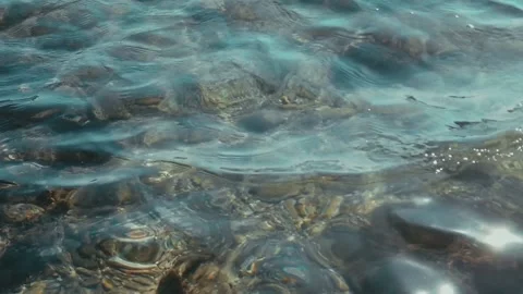 Slow motion of wavy clean beach water Stock Footage 219782527