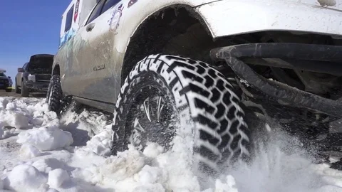 Slow motion Wheel of a car stuck in sand/Xinjiang,China. Stock Footage 70375313