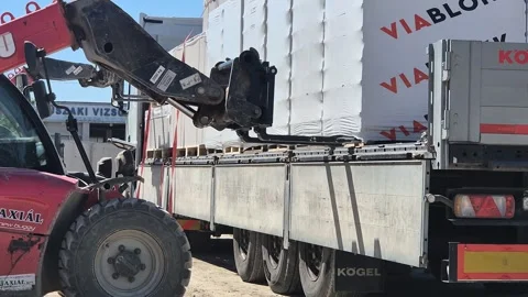 Slow Motion Wheel Loader Unloading Truck Budapest Stock Footage 336333105