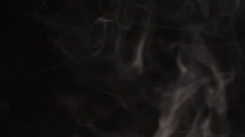 Slow motion of white abstract cigarette smoke on black background Stock Footage 134455110
