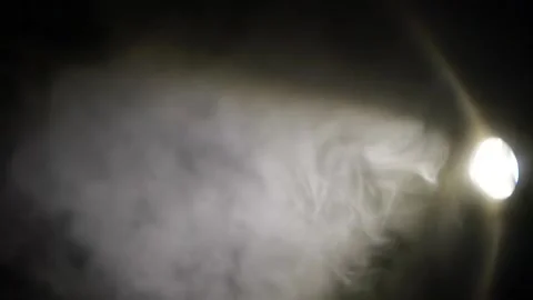 Slow motion of white abstract smoke, fog, steam cloud, mist on black background Видео 164579085