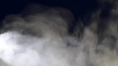 Slow motion white abstract smoke, fog, steam cloud isolated on black background Video stock 166077482