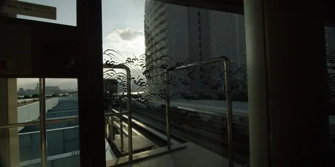 Slow motion of white fast train arriving at train station during sunset, Tokyo Stock Footage 136112910