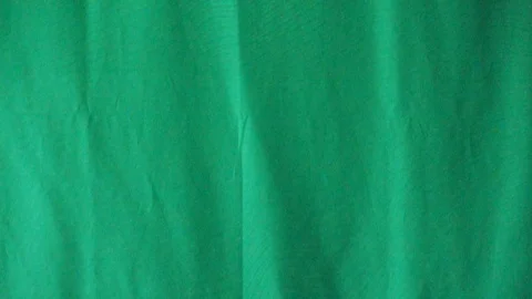 Slow Motion White Feather Falling against green Background, 스톡 동영상 109474631