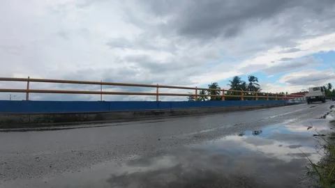 Slow Motion of White Flatbed Truck on Wet Road Stock Footage 340471001