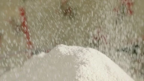 Slow Motion White Flour Falling on Pile in Bakery Kitchen 4K Vídeos de archivo 347364040