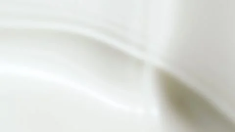 Slow motion white liquid cream ripples, close-up fresh milk drink splash texture Stock Footage 202056134