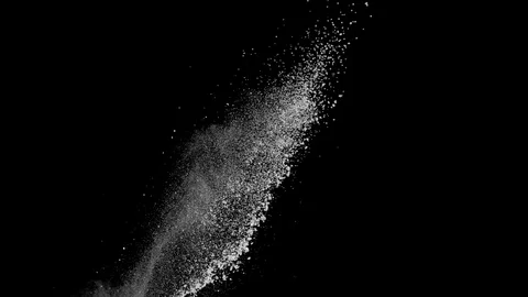 Slow motion white powder explosion on black background. Stock Footage 122492898