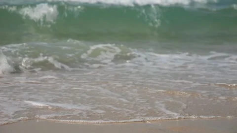 Slow motion of white sandy beach with blue ocean ripple wave splash tropical sea Stock-Footage 255644386