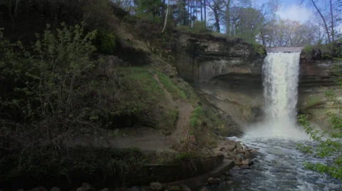 Slow-Motion, Wide-Angle of Water Tumbling Down Minnehaha Falls Video stock 66692915