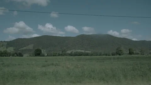 Slow Motion Wide Shot of Sunshine Coast Hinterland Grassland and Mountain Scener Stock Footage 341297459