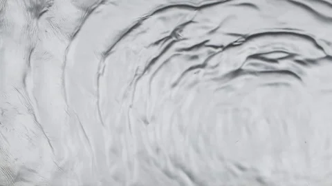 Slow motion. Wind blowing on liquid silver paint. Waves of silver paint Stock Footage 171102695