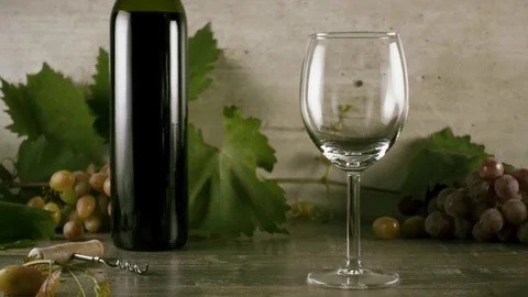 Slow motion wine is beautiful to pour into a glass of still life Video stock 92914652
