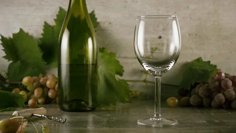 Slow motion wine is beautiful to pour into a glass of still life Stock Footage 92914919