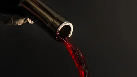 Slow motion wine is poured on a Stock Footage 148158262
