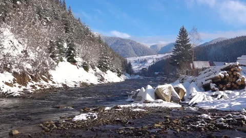 Slow motion. winter landscape. river tereblya. village synevyr. mountains in  Video stock 170553197