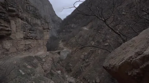 Slow Motion Winter Mountain and Valley with Big Gey Rocky Stones 3 Stock Footage 239858171