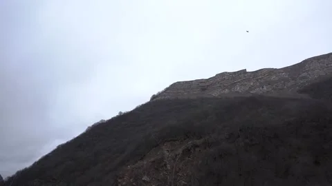 Slow Motion Winter Mountain and Valley with Big Gey Rocky Stones 2 Stock Footage 239858418