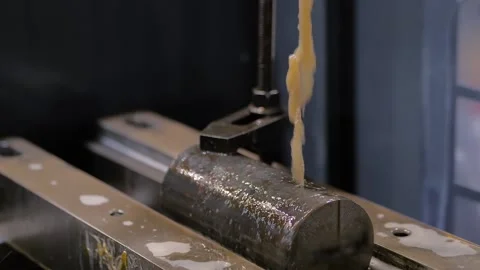 Slow motion: wire cutting machine working with metal workpiece with sparks Stock Footage 139750128