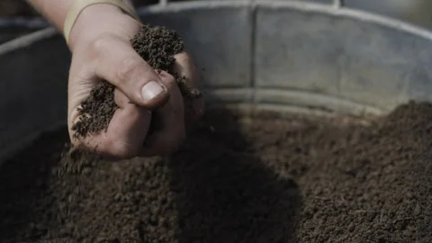 Slow Motion Woman's Hand in Soil 스톡 동영상 266914176