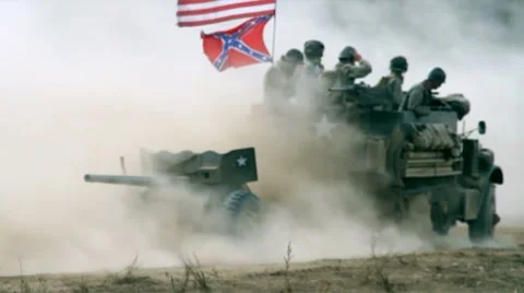 Slow Motion World War II American military halftrack drives through dust Stock Footage 8779343