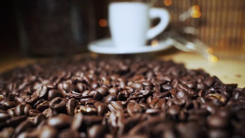 Slow motion of worm coffee beans Stock Footage 128841754