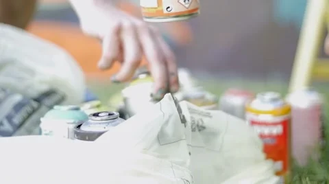 Slow motion of writers hands picking spray cans Stock-Footage 51725565